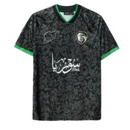 Black Syria national football jersey with green trim, floral pattern design, Arabic calligraphy, Syria map emblem, and number 24 on the back – men's XL size.